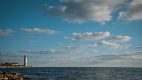 Lighthouse On The Seashore Under Clouds By Aleks_sg Videohive