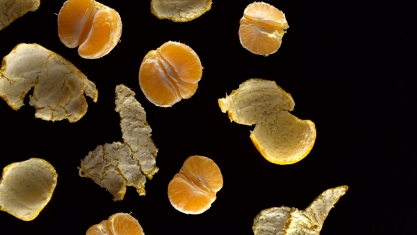 Frash Tangerines on Black Background.