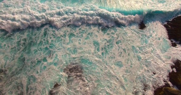 Aerial of White Ocean Foam. Top View of Ocean Waves. Ocean Waves Very Closer