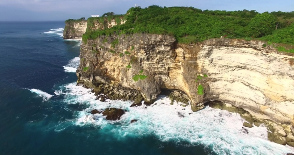 Uluwatu Cliff Aerial Footage, Bali, Indonesia. Beautiful Drone View To Cliff