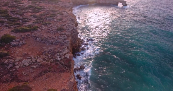 Beautiful Seashore with Clifs at Sunset