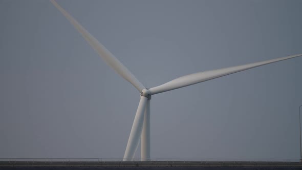 clean and renewable wind power farm in motion converting kinetic energy modern electric industry alt