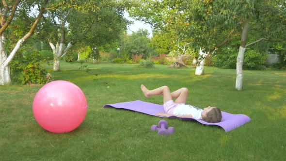 The Girl Doing the Exercise in the Garden alt