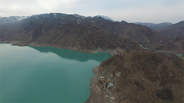 An Aerial View of the Reservoir and Dam in the Mountains of Kazakhstan.