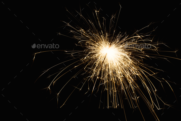 New year party sparkler closeup on black background - Stock Photo - Images