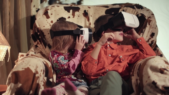 Kids Looking Through VR Headset and Gesticulating alt