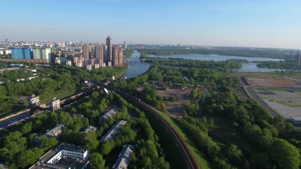 Moving Suburban Electric Train on the Bridge Near the Junction alt