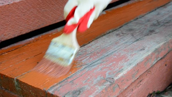 Person Paints with Paint Old Stairs