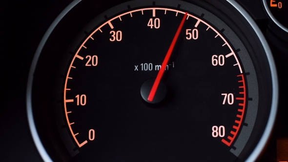 Car Tachometer and Moving Pointer on It.