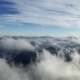 Aerial Drone Flying Over Mountains and Clouds - VideoHive Item for Sale