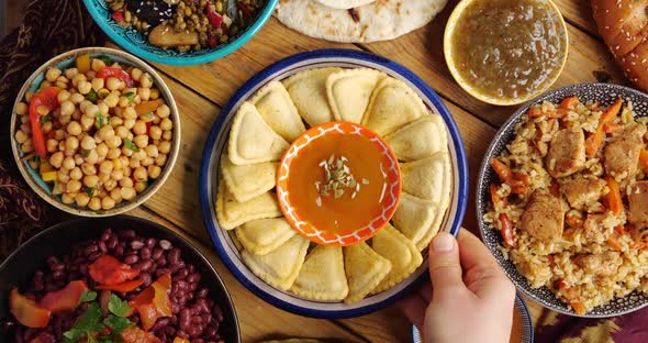 A Samosa is a Fried or Baked Pastry with a Savory Filling alt