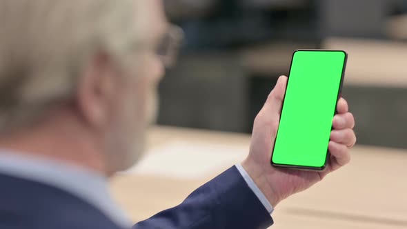 Male Doctor Using Smartphone with Chroma Screen alt