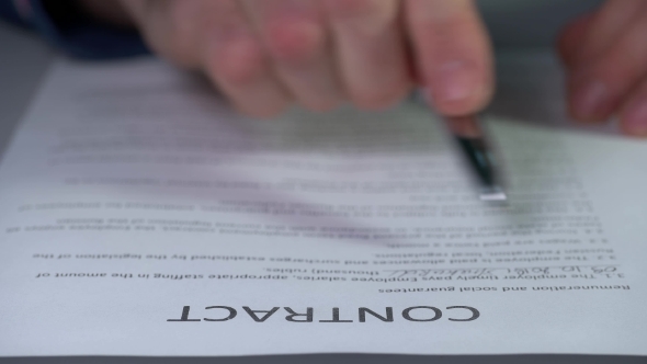 People Put a Signature on the Document alt