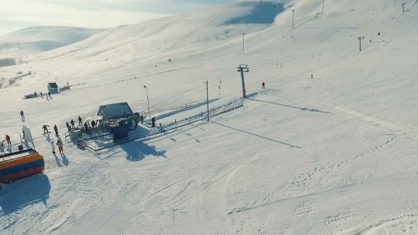 Aerial Footage of the Bottom End of Ski-lift.