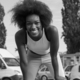 African american woman running outdoors Stock Photo by