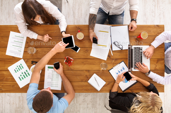 Group of busy business people working in office, top view - Stock Photo - Images