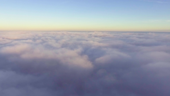 Flyig Above Clouds at Morning