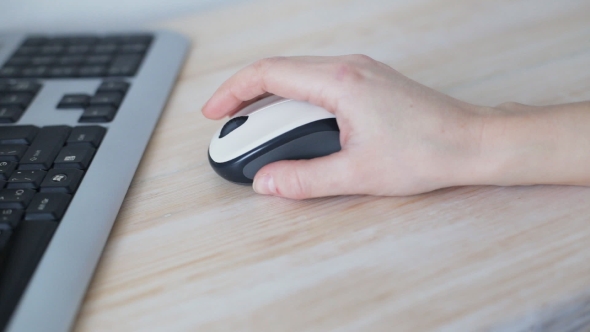 Woman Using Mouse