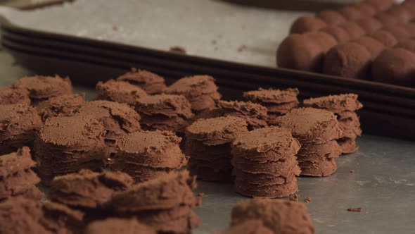 Making chocolate truffles in a candy factory