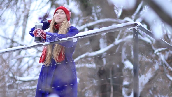 Young Woman Enjoying Winter Landscape alt