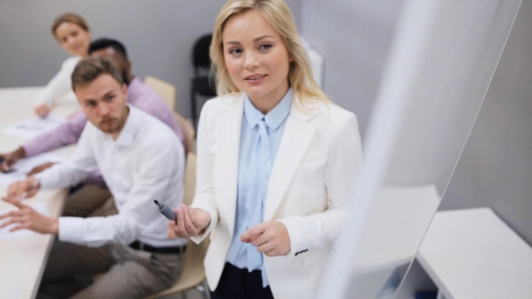 Business Team at Presentation in Office alt
