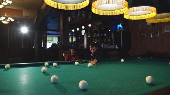 Handsome Serious Man Playing Pool alt