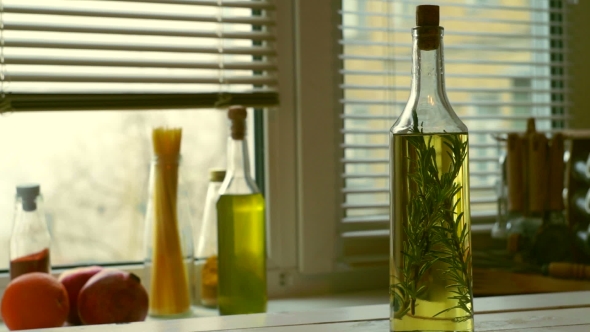 Cooking Oil Bottle on Kitchen Background alt