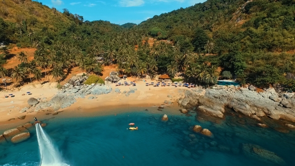 Aerial: Flyboard and Jetski on the Beach alt