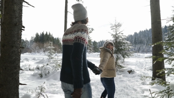 Couple Winter Snow Forest Walking Man And Woman Holding Hands In Snowy ...
