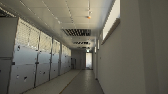 Camera Moves Along the Corridor Where There Are Large Wardrobes in Which Industrial Air Filters alt