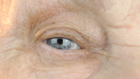 of Blue Eye of a Woman Aged 80s