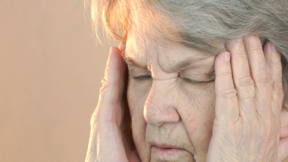 Old Woman Aged 80s Suffers From Headaches alt