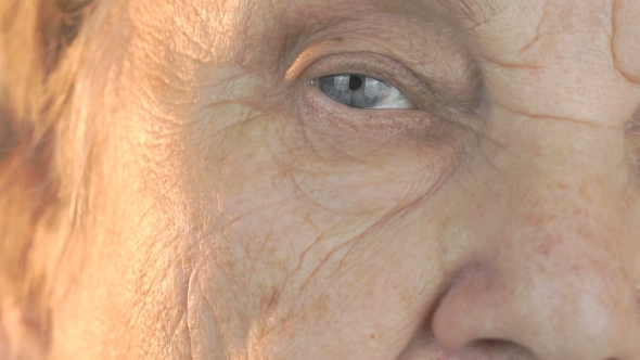 Elderly Woman Opening and Closing Eyes