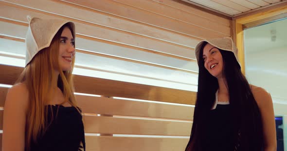 Girls Talk and Laugh in the Sauna alt