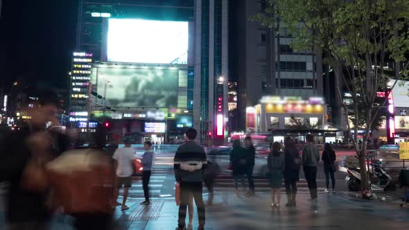Timelapse of Pedestrians on Zebra Crossing in Night Seoul, South Korea alt