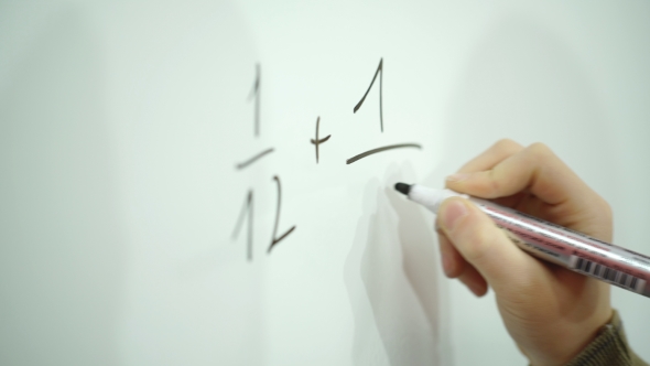 Boy Exercise Math on School Board