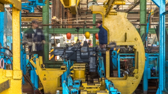 Tractor Engine Assembled on the Factory Production Line on Tractor Factory alt