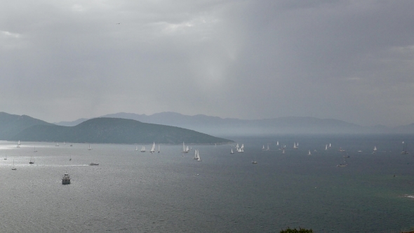 Sea Scenery with Sailing Yachts in a Cloudy Day