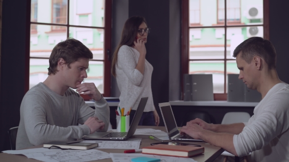 Colleagues Working at the Project at Work., Stock Footage | VideoHive