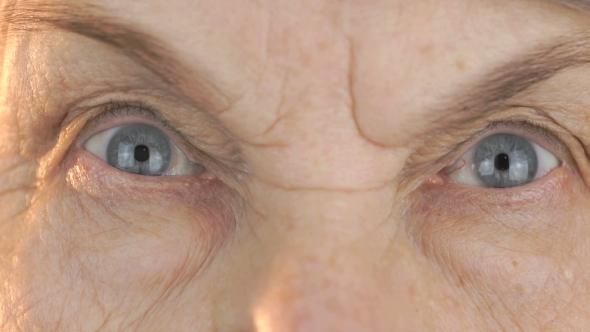 Elderly Woman's Face with Disturbing Look of Face alt