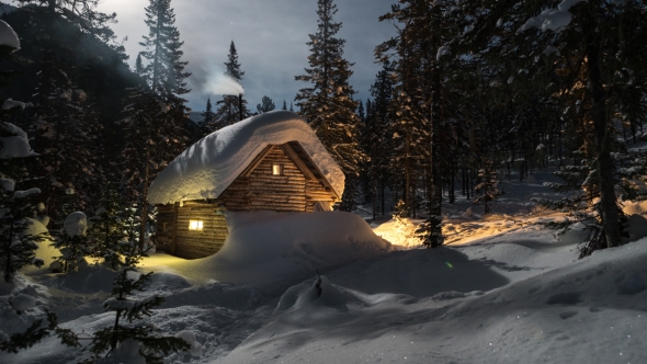 Wooden Lodge with Lightning Windows in Winter Forest.