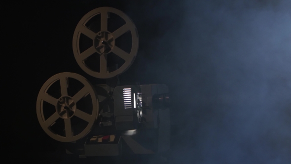 Working Projector in the Smoke. Black Background Studio, Stock Footage