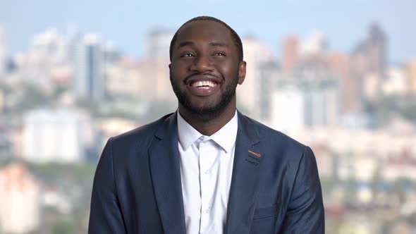 Black Businessman Satisfied with Good News alt