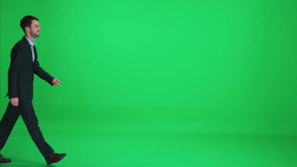 Passerby Men in a Suit Walks on a Green Background a Happy Men Walks Down the Street Template on a alt