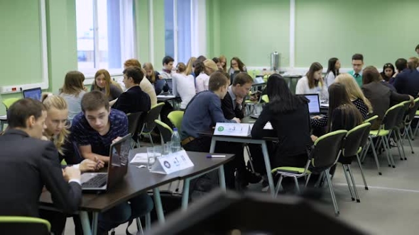 Practical Training of Students on Laptops on the Lesson of Economy. Students Teambuilding for alt