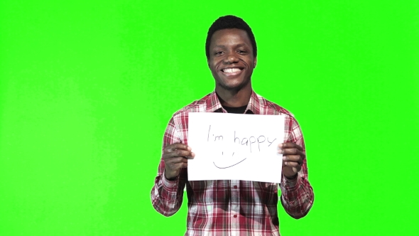 African Man Holds Up Happy Sign alt