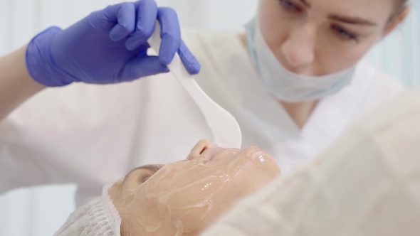 Master Beautician Prepares the Patient for the Procedure. alt