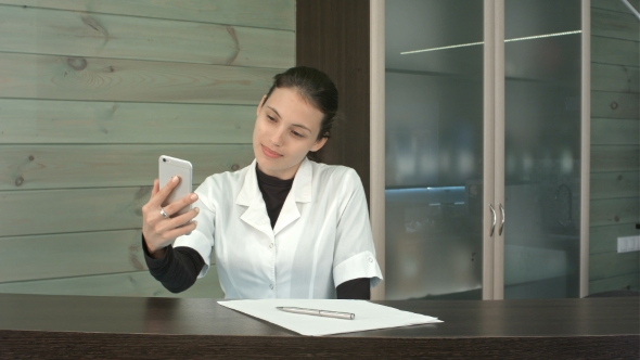 Happy Spa Manager Taking Selfies With Her Phone At The Reception Play Preview