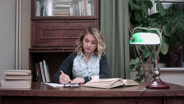Busy Working Young Woman Making Notes and Choking on Coffee After Drinking It alt