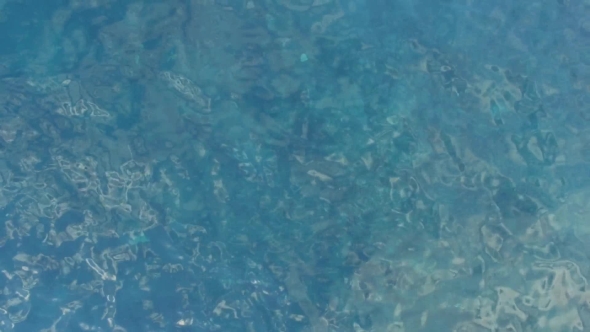 Aerial View of Clear Blue Water in Lagoon alt